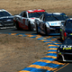 Each car except for the Stewart-Haas No. 10 of Aric Almirola runs a fixed wiper in the sun in a photo from the Monster Energy NASCAR Cup Series race at Sonoma in June.